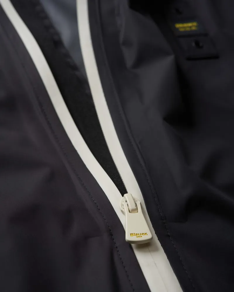 Giubbino Thomas nero con cappuccio e zip termonastrate