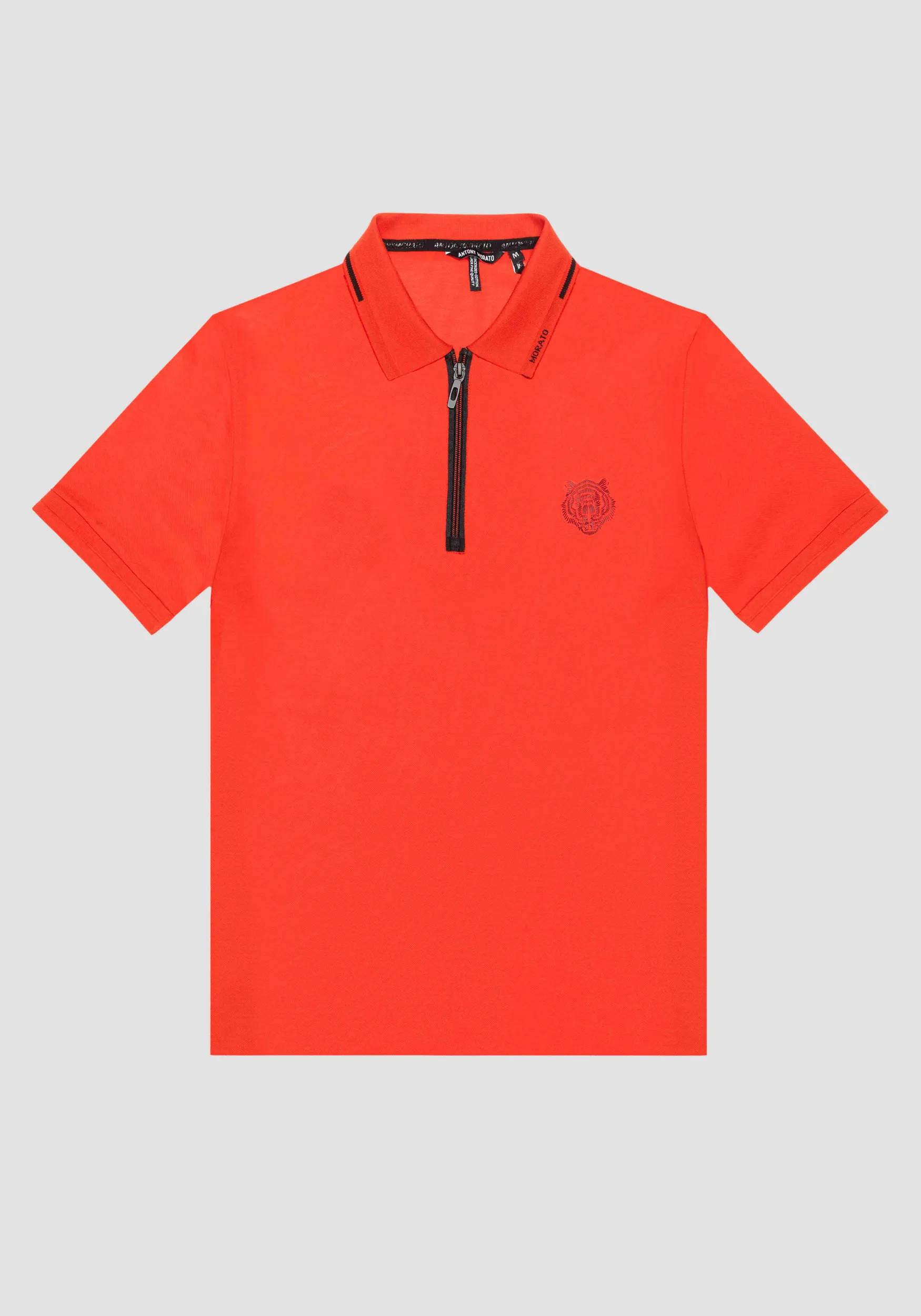 POLO SLIM FIT IN PIQUÉ DI COTONE MERCERIZZATO CON STAMPA TIGRE GOMMATA